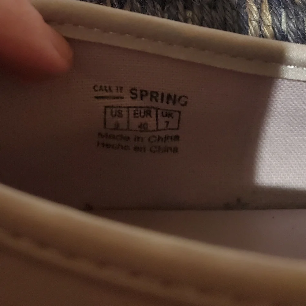 Call it spring purple flat slip on Sneakers shoes.